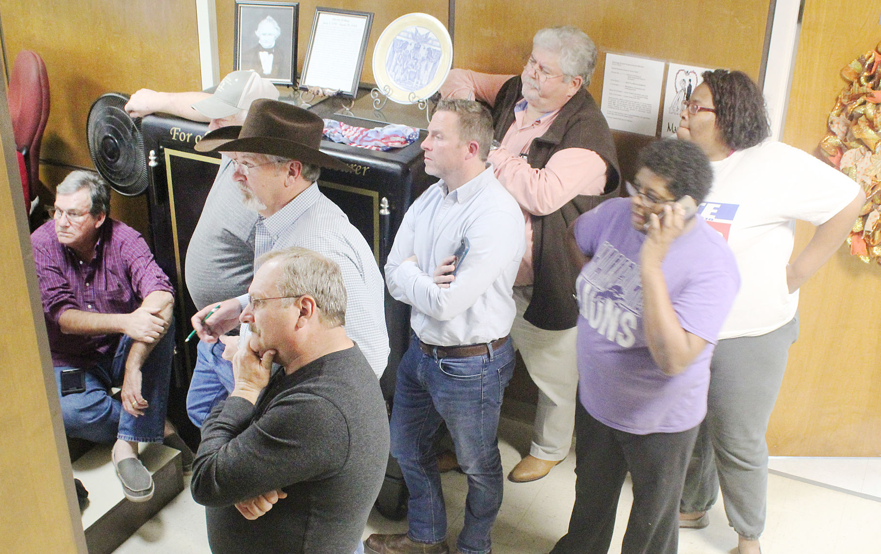 Candidates and supporters wait for poll results